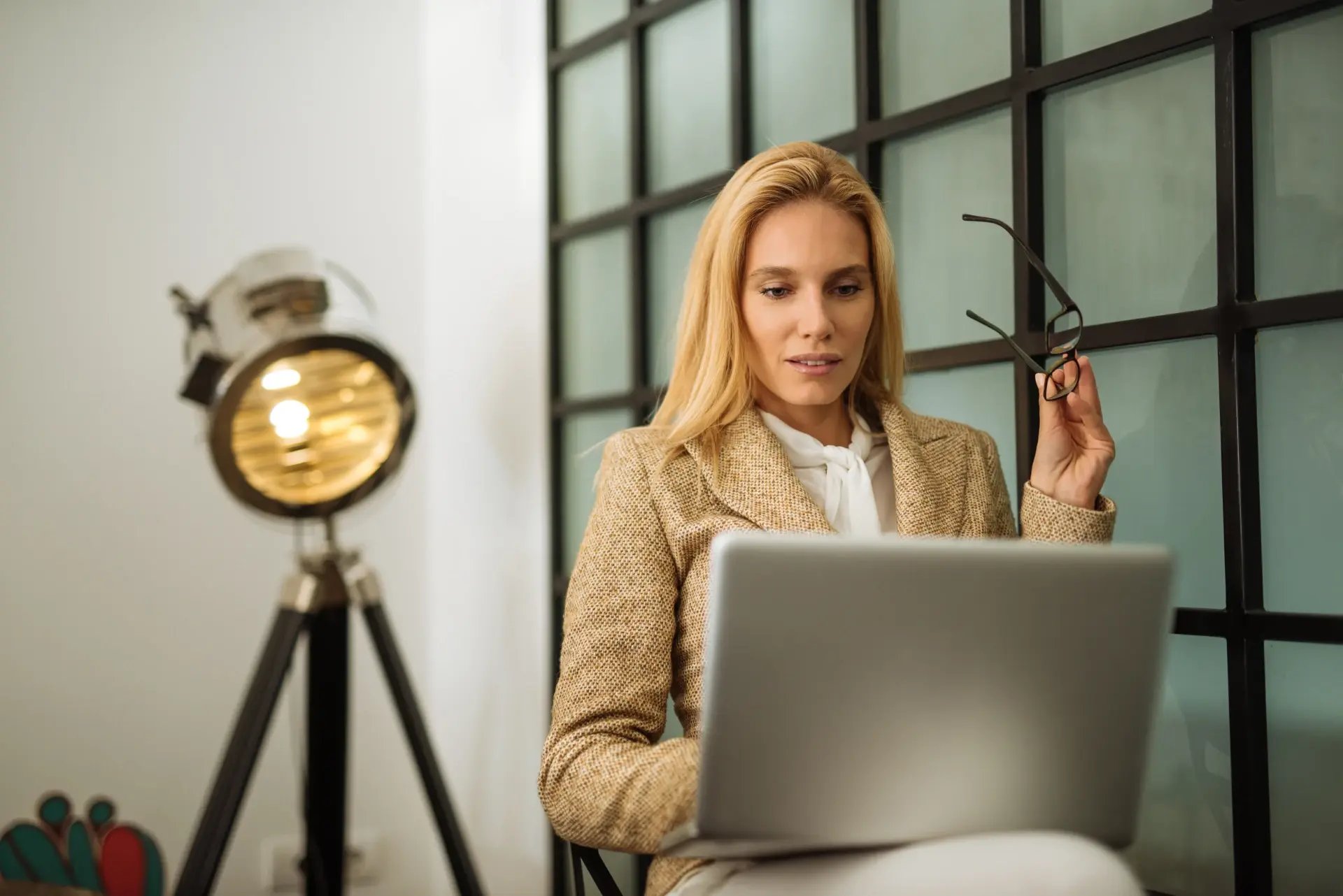 professional-woman-working-on-laptop-at-office-2026-01-05-05-19-59-utc