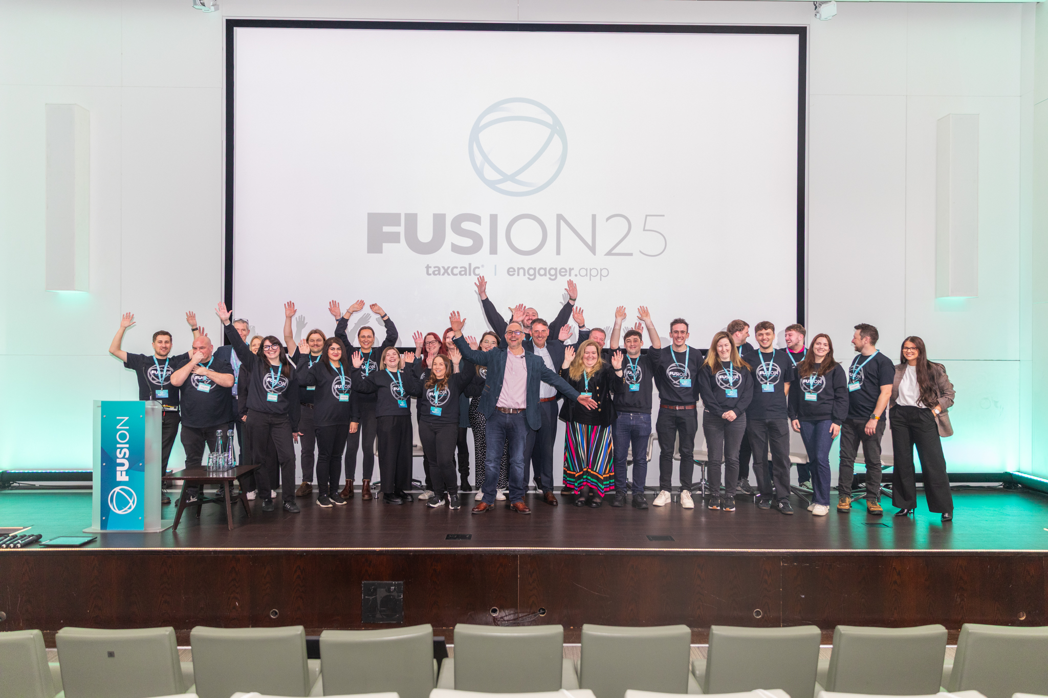 The TaxCalc team on stage at Fusion25